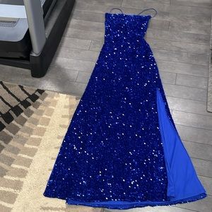 Lady’s formal dark blue sequined dress.